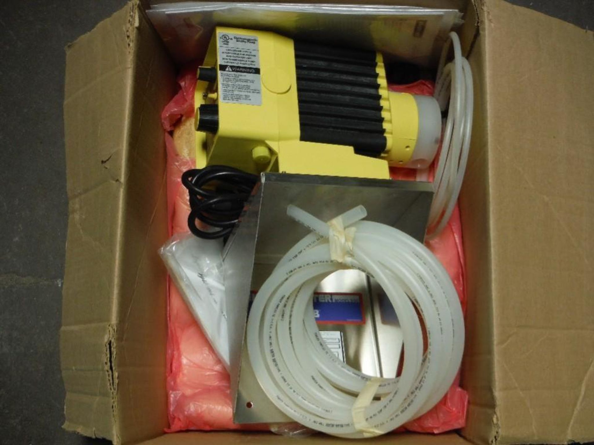 LMI chemical feed pump, new in box. - RIGGING FEE FOR DOMESTIC TRANSPORT $25