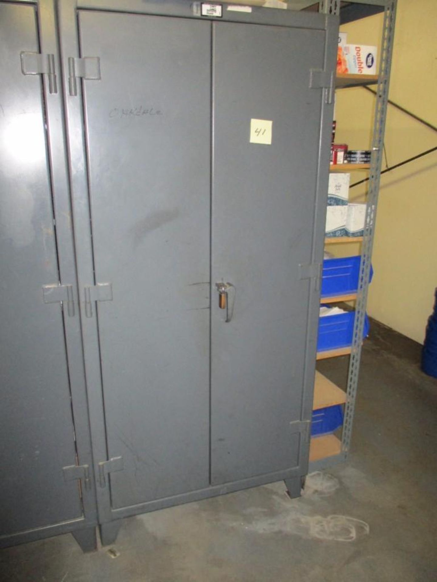 Strong hold steel cabinet, 36 in. long x 24 in. wide x 78 in. tall. Rigging Fee: $75