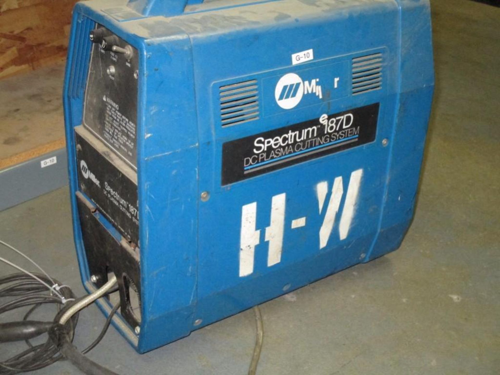 Miller portable spectrum plasma cutter, Model 187D DC. Rigging Fee: $25