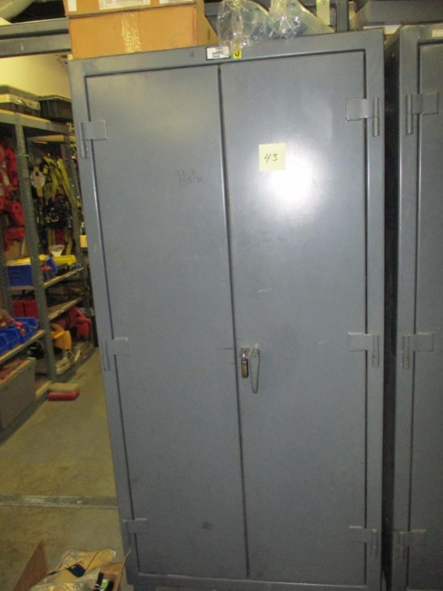 Strong hold steel cabinet, 36 in. long x 24 in. wide x 78 in. tall. Rigging Fee: $75