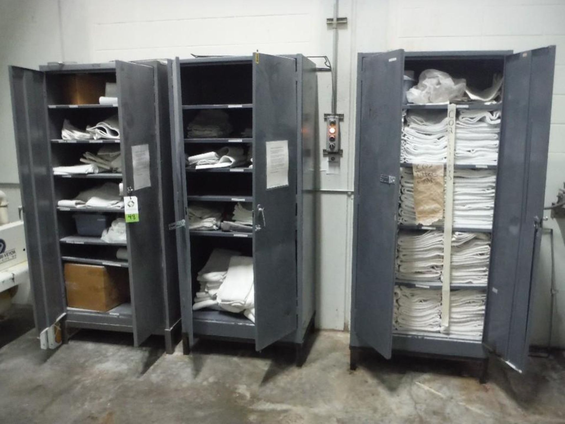 (3) cabinets and filter socks, and 2 carts of sock plates (LOT) - Rigging Fee: $150