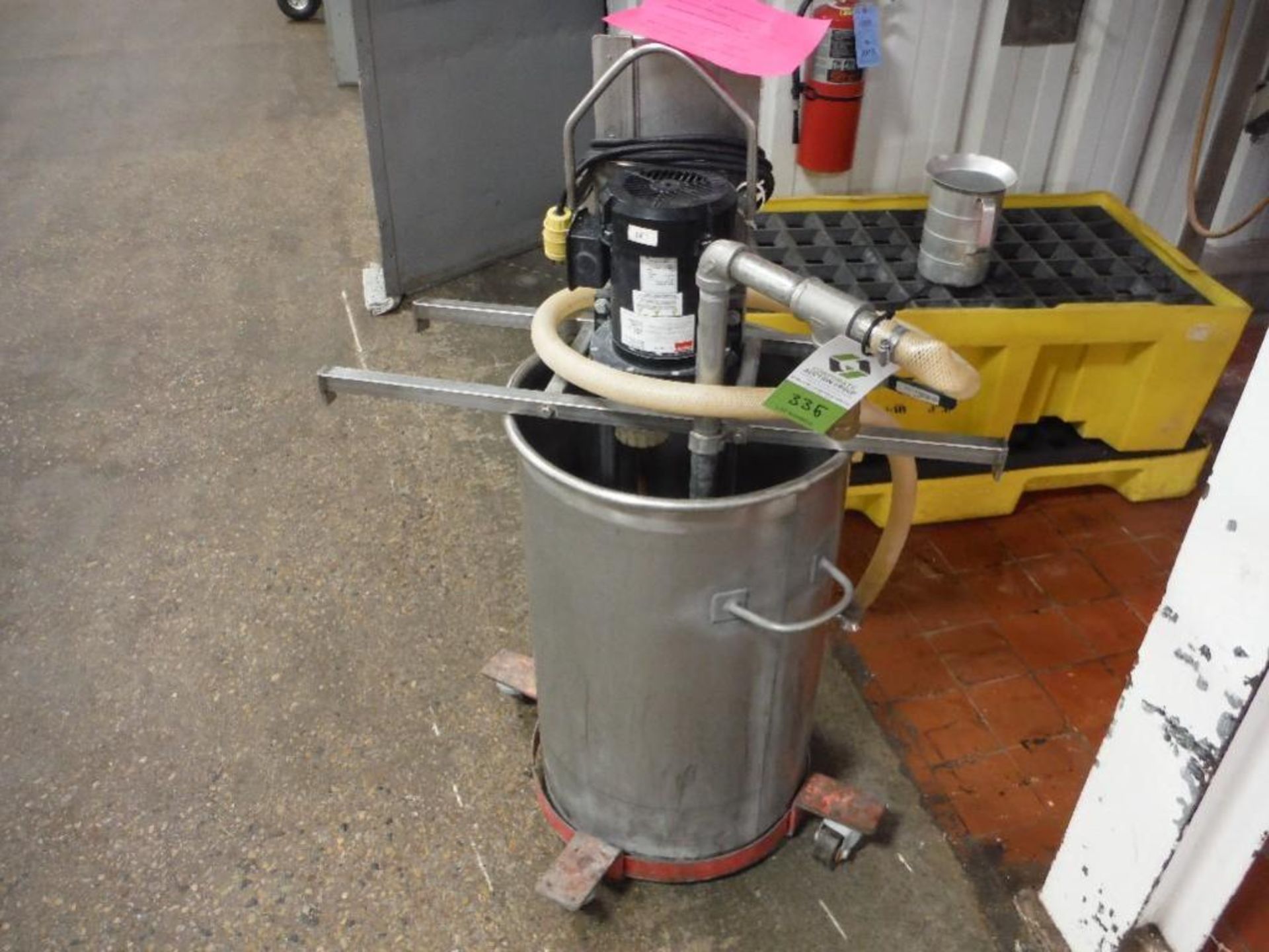 SS tank 18 in. dia x 28 in. tall, on casters, with pump - Rigging Fee: $150