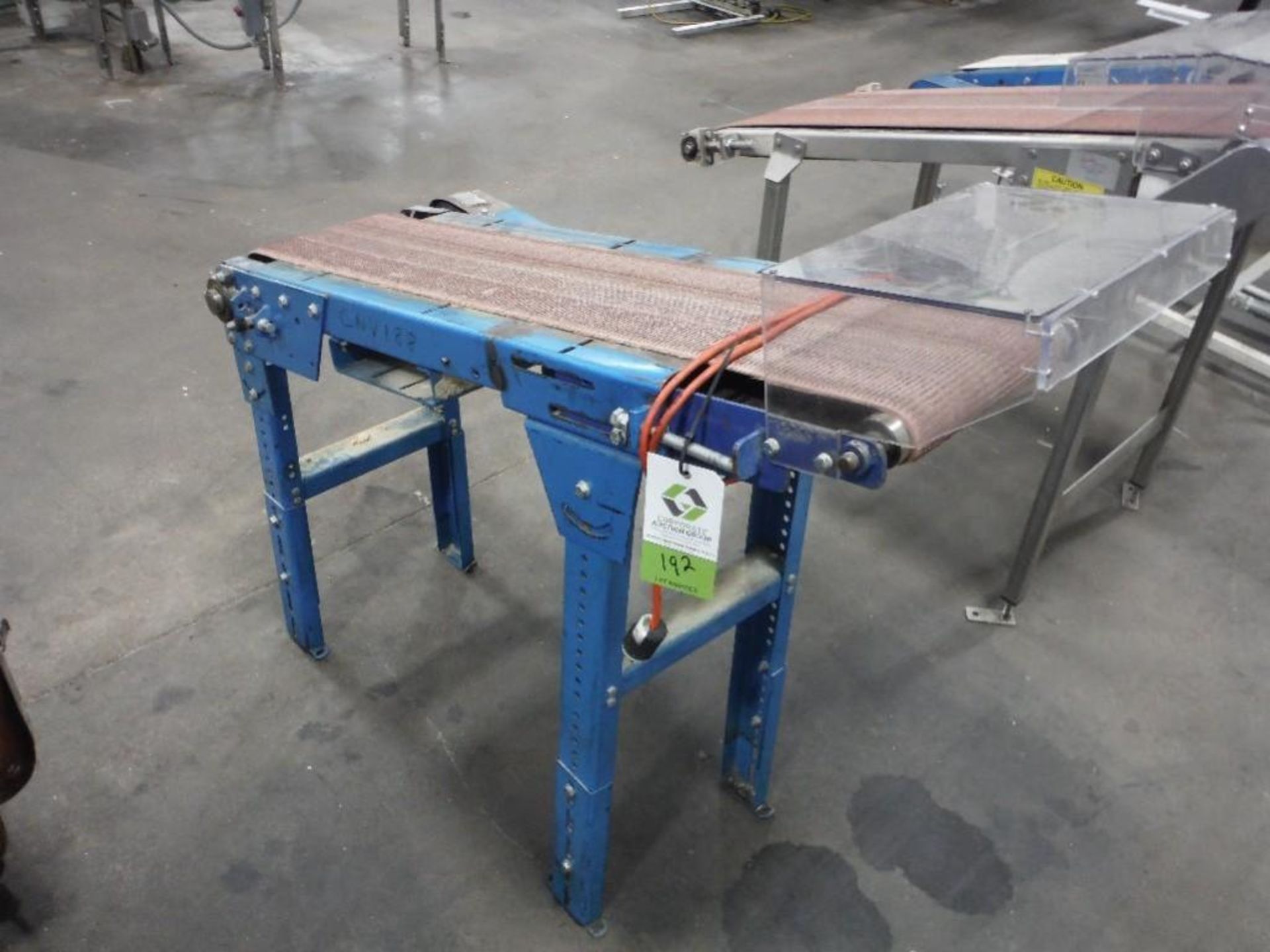 Incline belt conveyor, 48 in. long x 10 in. wide x 28 in. infeed x 43 in. discharge, steel frame, wi