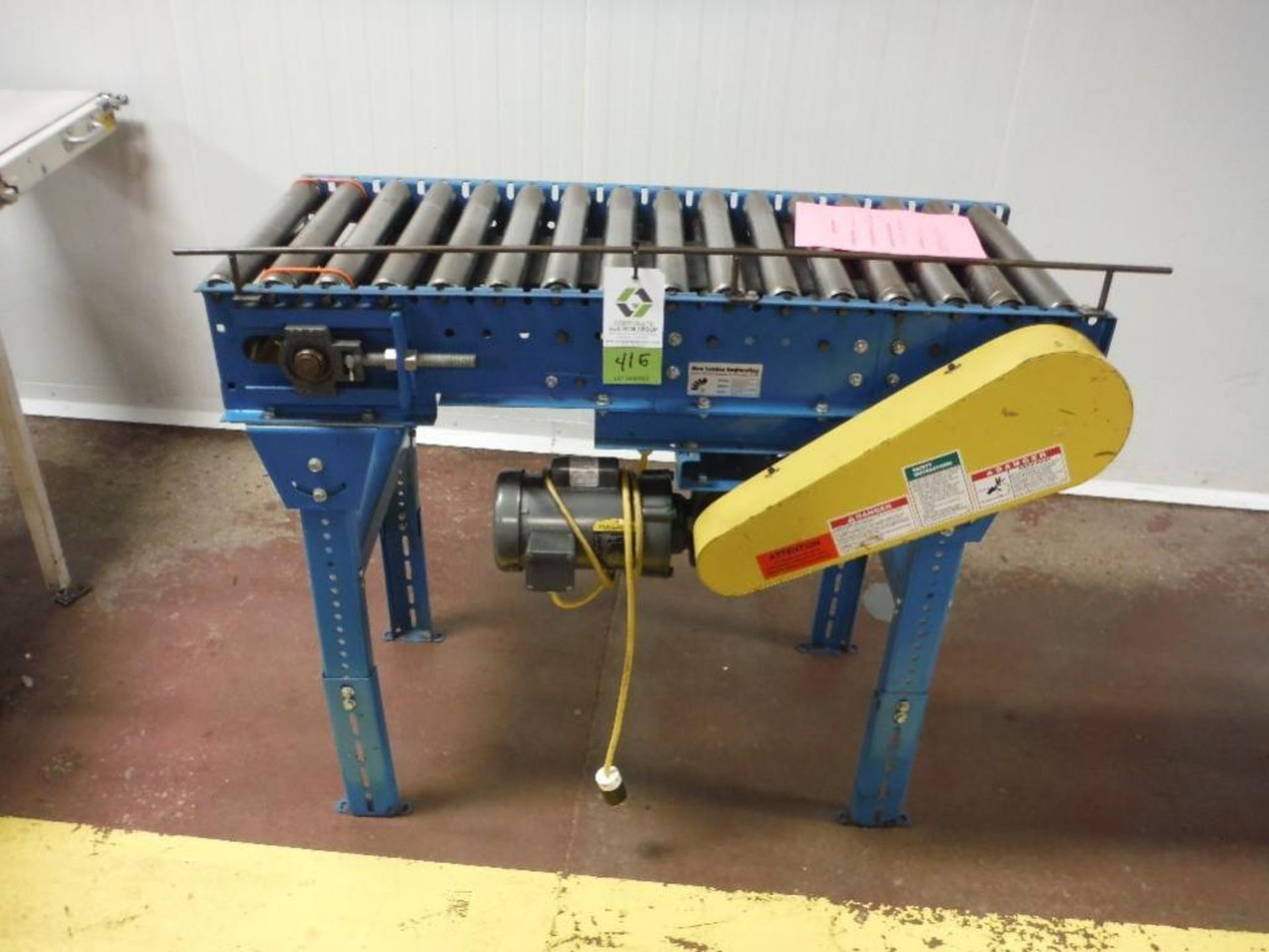 New London powered roller conveyor, 48 in. long x 16 in. wide rollers, motor and drive, steel frame