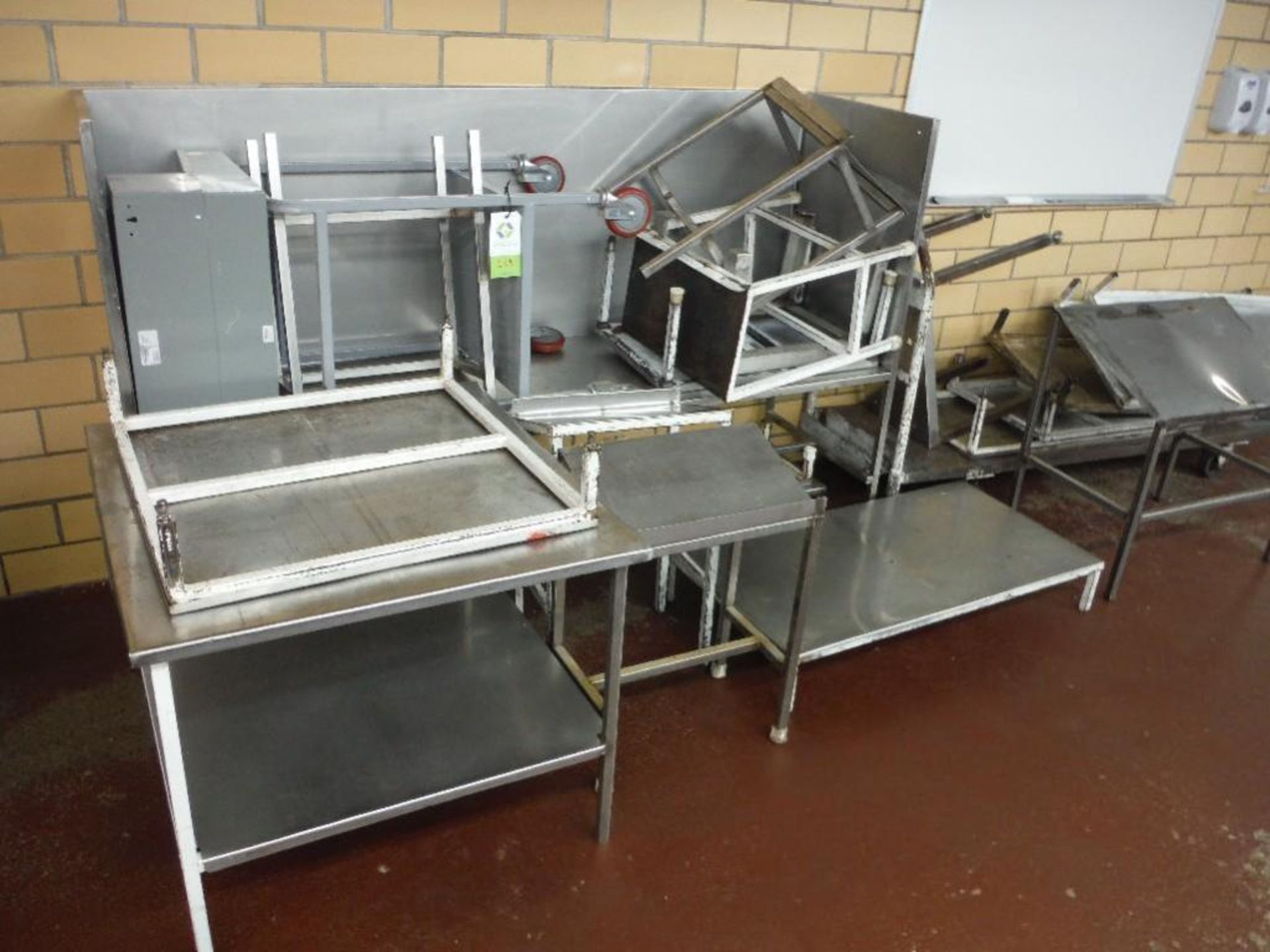 Lot of assorted SS tables, and steel tables and steps - Rigging Fee: $250