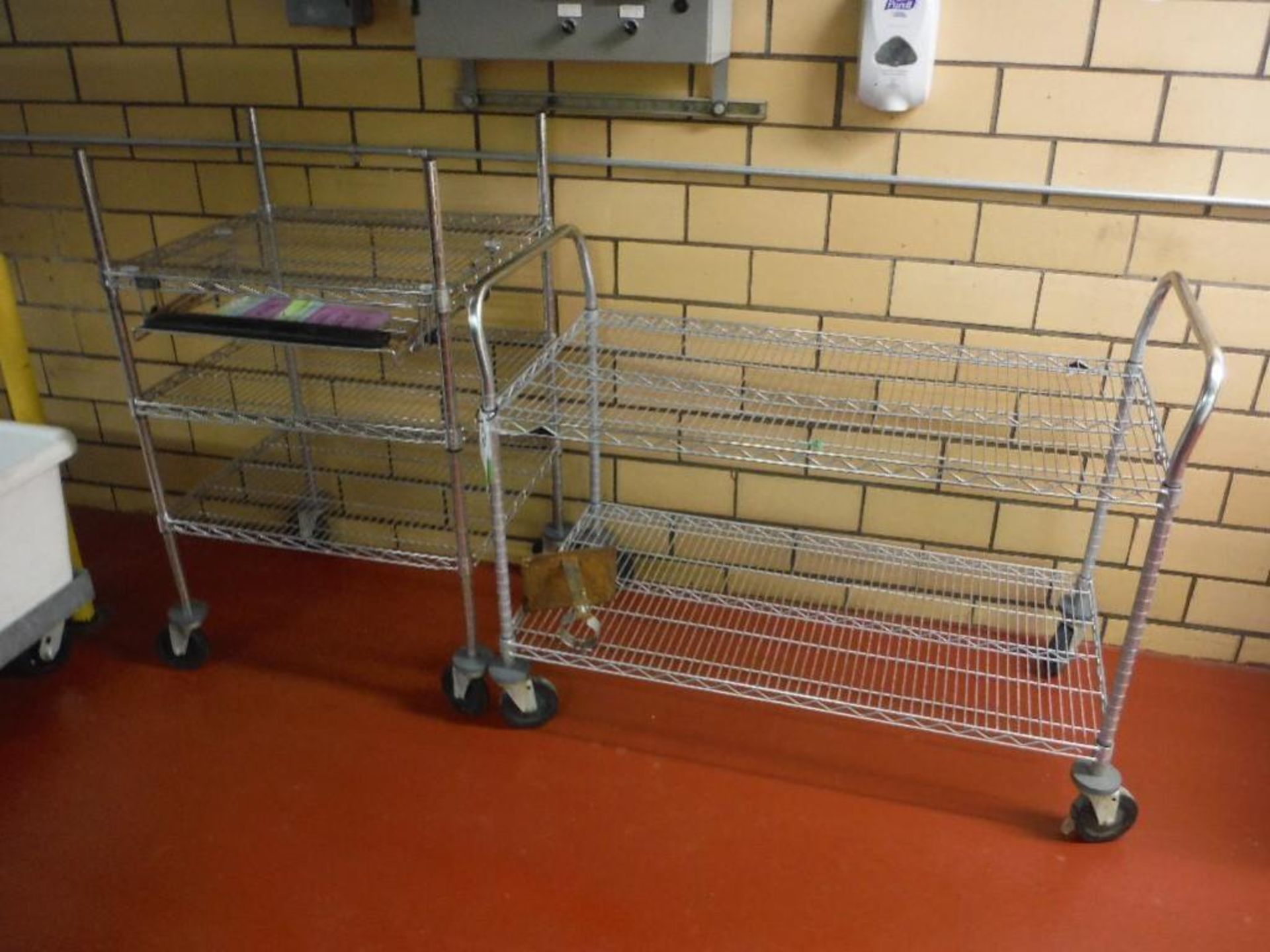 (2) wire metro racks, on wheels (LOT) - Rigging Fee: $25