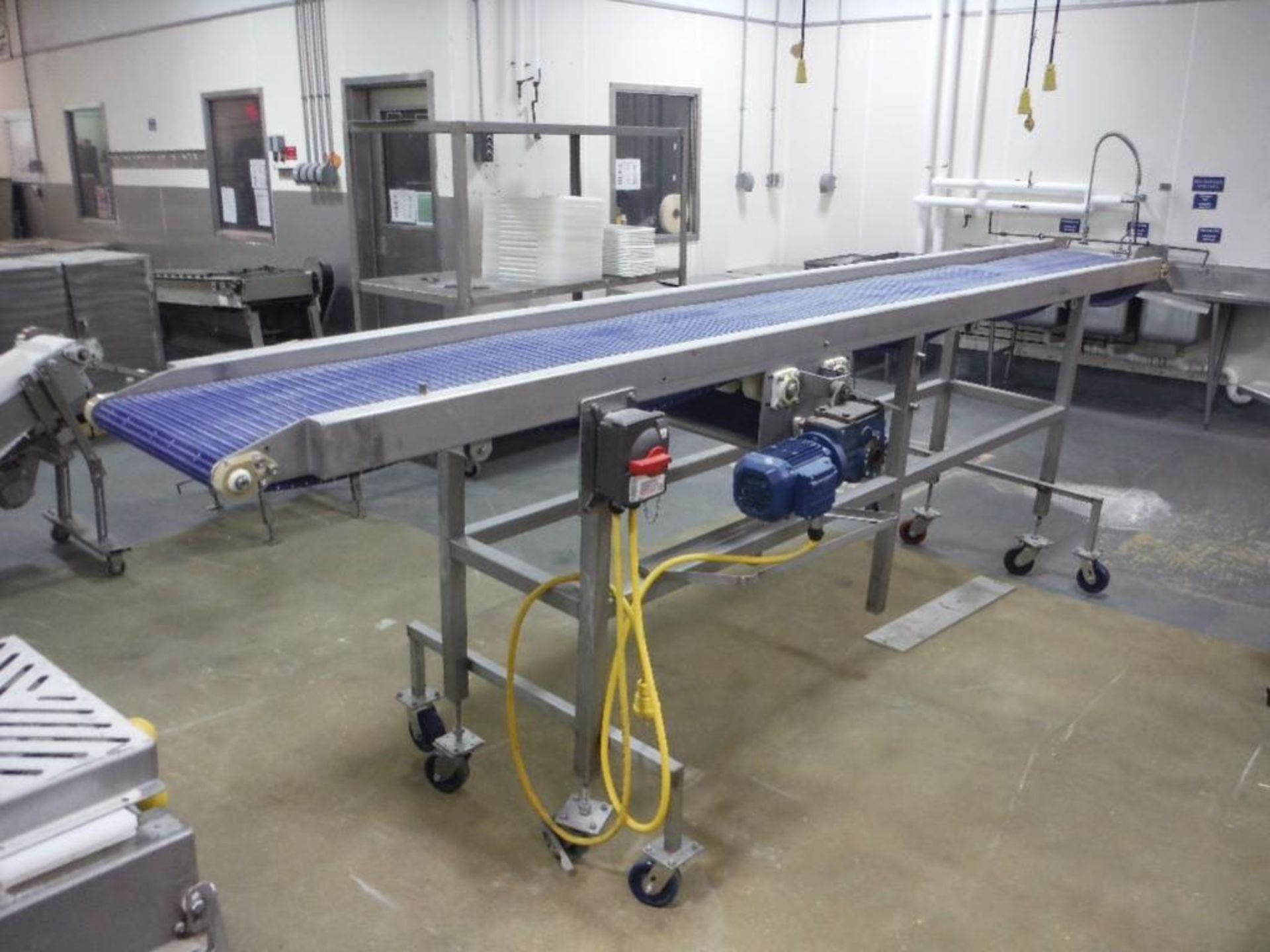 SS conveyor, plastic intralox belt, 15 ft. long x 18 in. wide x 48 in. tall, on wheels, motor and dr