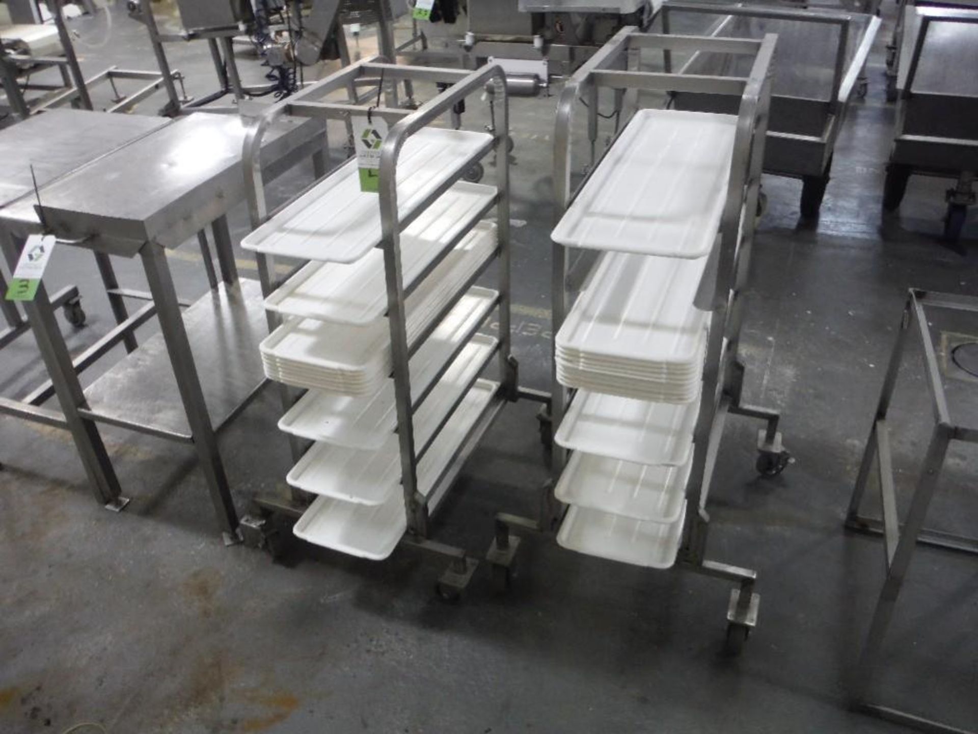 (2) SS pan carts for 11 in. x 26 in. trays, 6 shelves each, with pans (lot), **(Located in: Marshall - Image 3 of 4