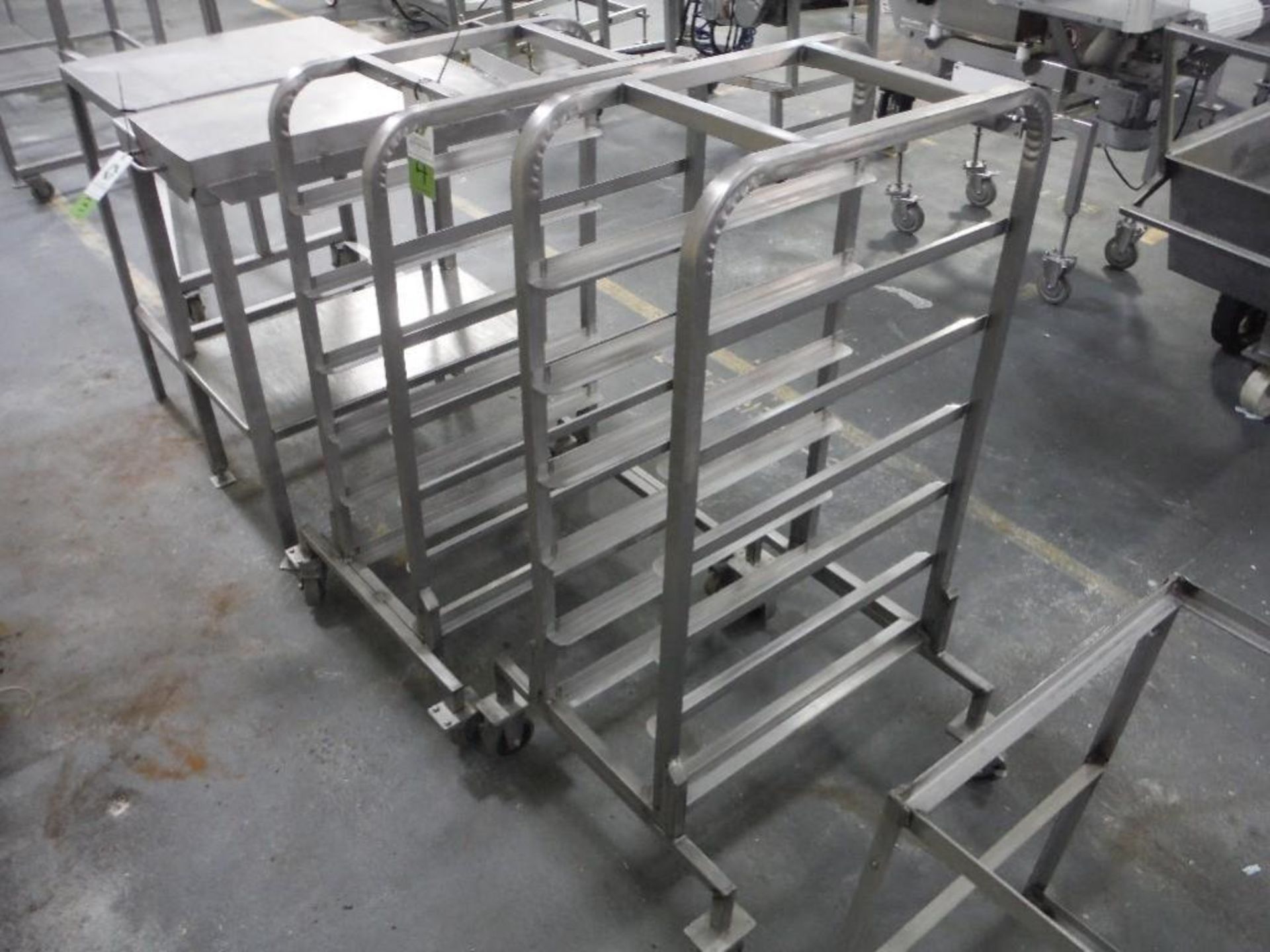 (2) SS pan carts for 11 in. x 26 in. trays, 6 shelves each, with pans (lot), **(Located in: Marshall - Image 2 of 4