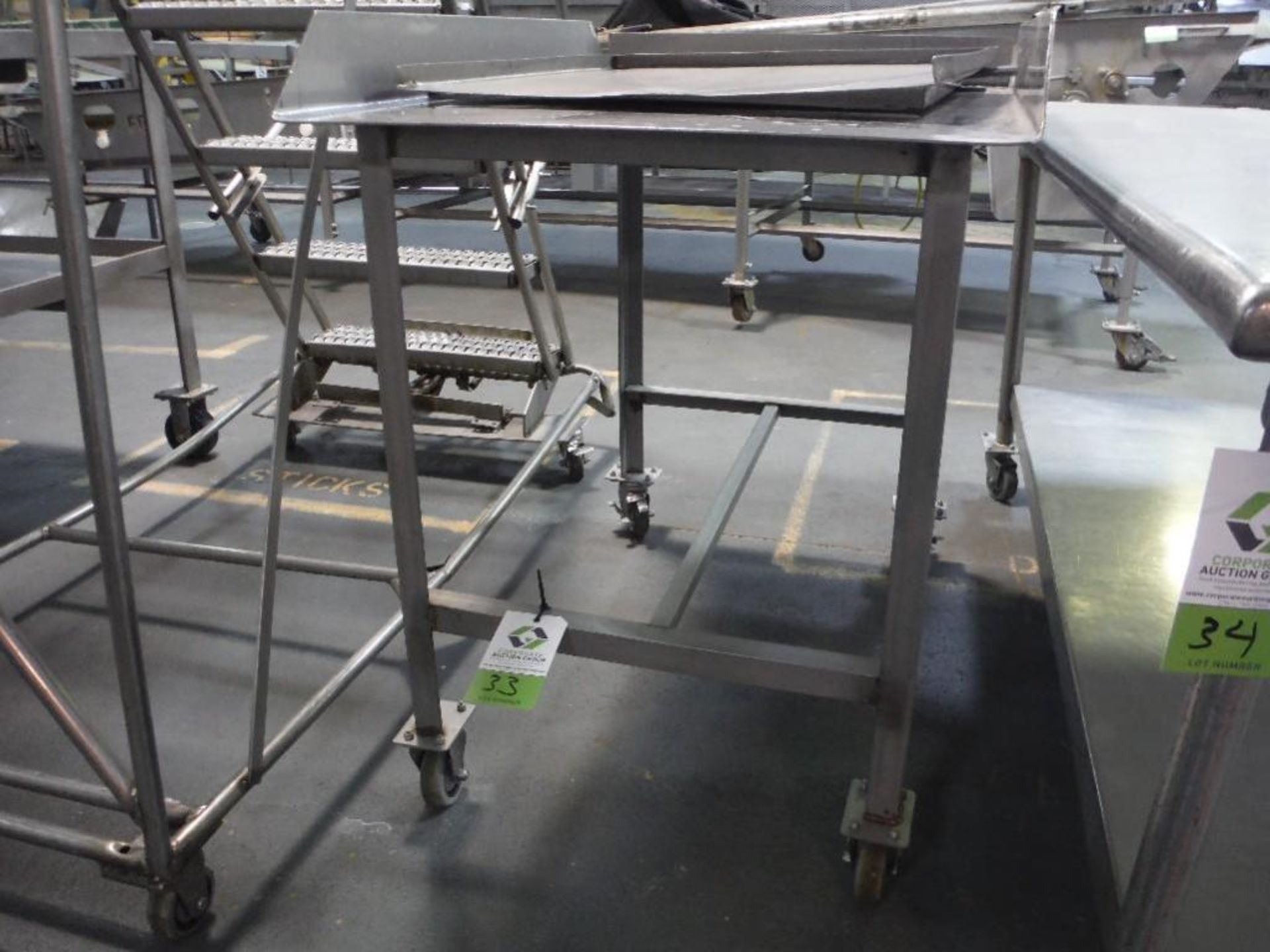 SS table, 42 in. long x 29 in. wide x 36 in. tall, on wheels, **(Located in: Marshall, MN)** Rigging - Image 2 of 2