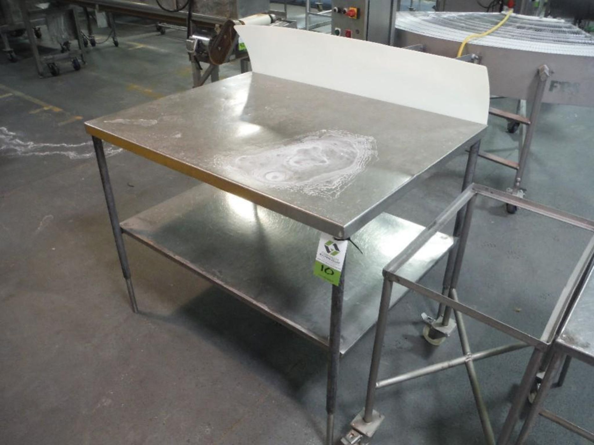 SS table, mild steel legs, 48 in. long x 36 in. wide x 38 in. tall, **(Located in: Marshall, MN)** R - Image 2 of 2