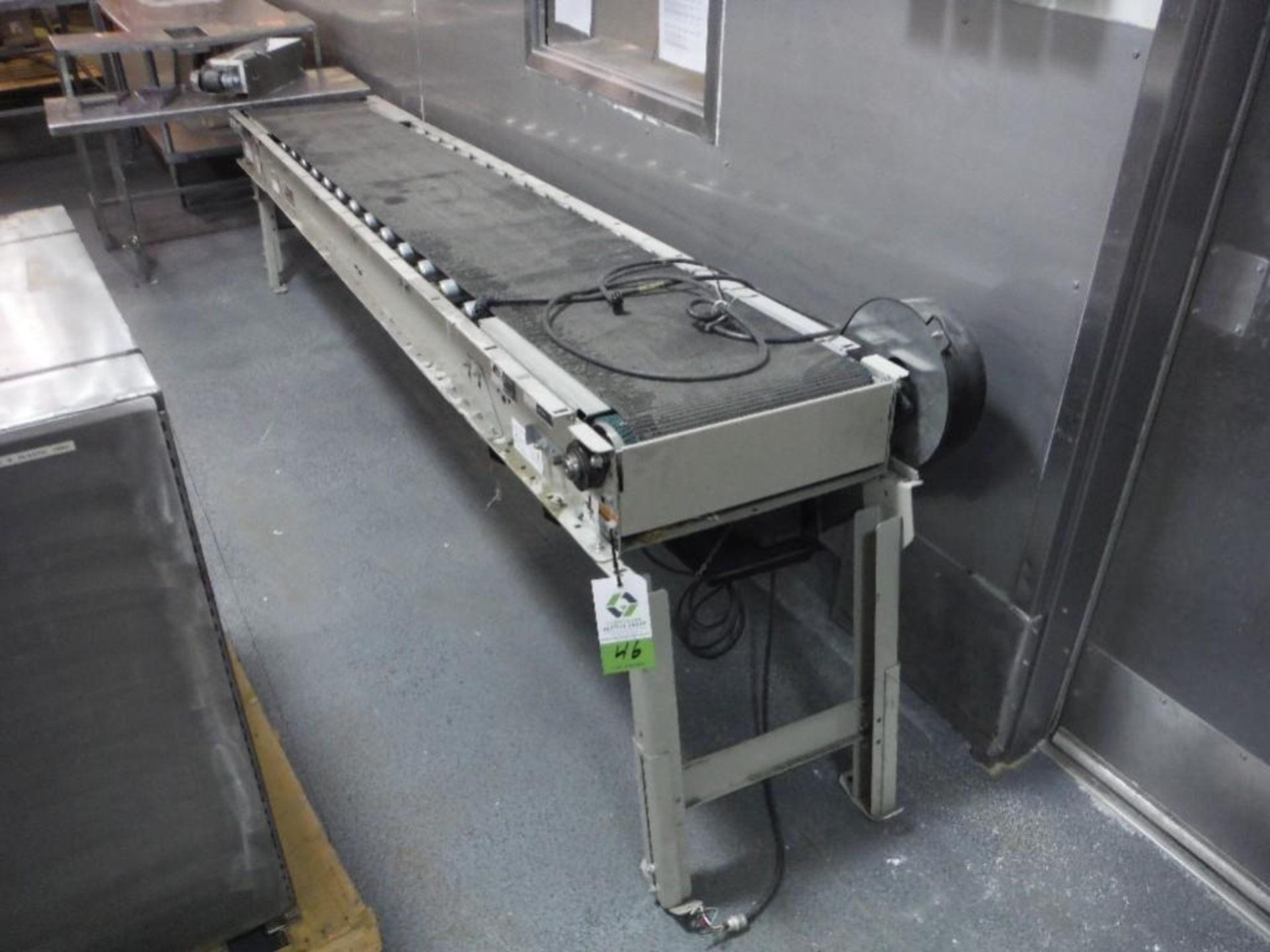 HK systems rubber belt conveyor, 125 in. long x 17 in. wide x 32 in. tall, adjustable legs, mild ste