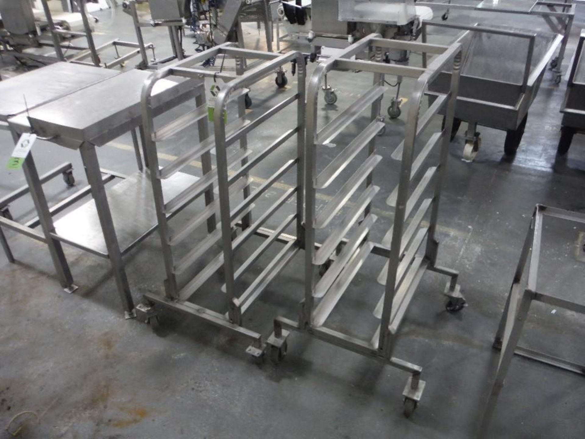 (2) SS pan carts for 11 in. x 26 in. trays, 6 shelves each, with pans (lot), **(Located in: Marshall