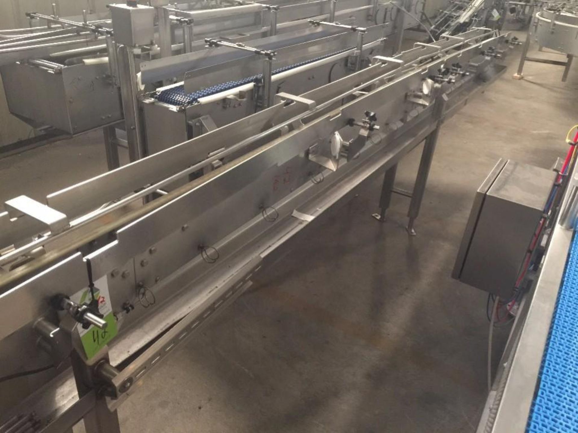 Multi-Conveyor, SS conveyor into timing screw, 3 1/4 in wide x 260 in long table top chain, motor an - Image 11 of 16