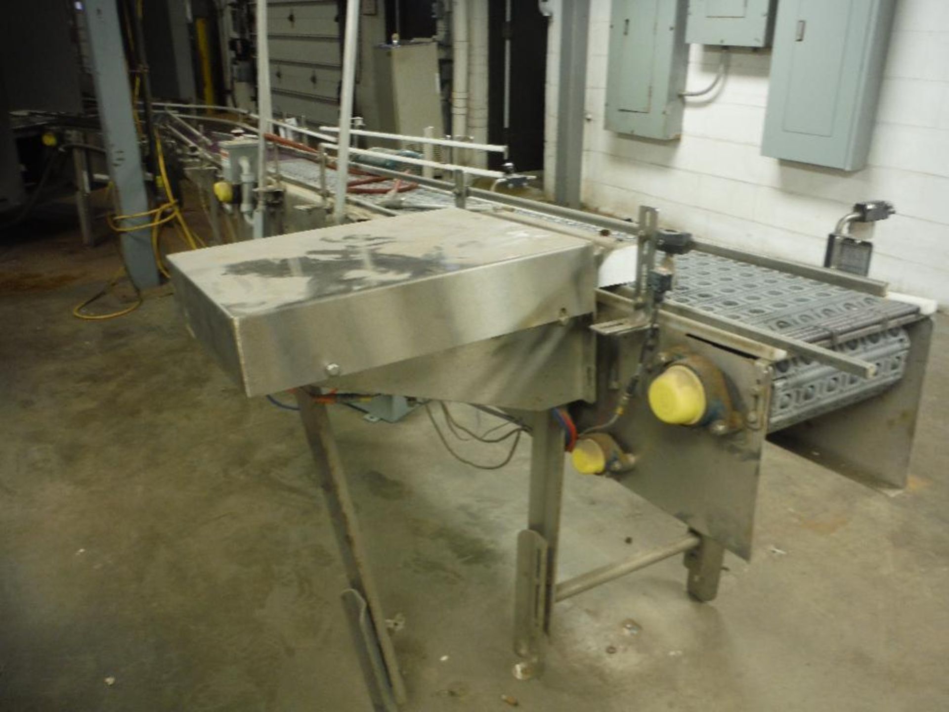 SS infeed conveyor, 102 in. x 12 in., w/ drive and reject ram. Rigging Fee: $150 - Image 4 of 10