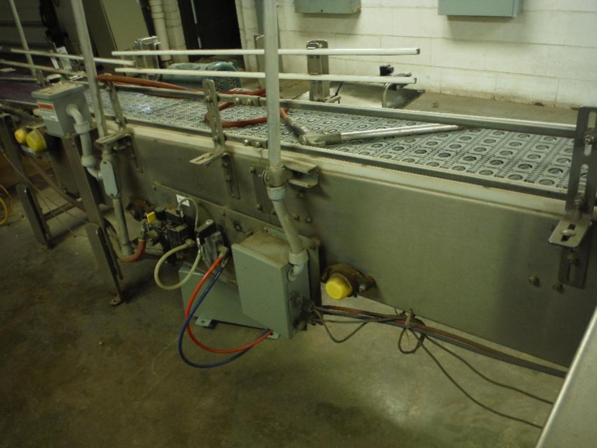 SS infeed conveyor, 102 in. x 12 in., w/ drive and reject ram. Rigging Fee: $150 - Image 6 of 10