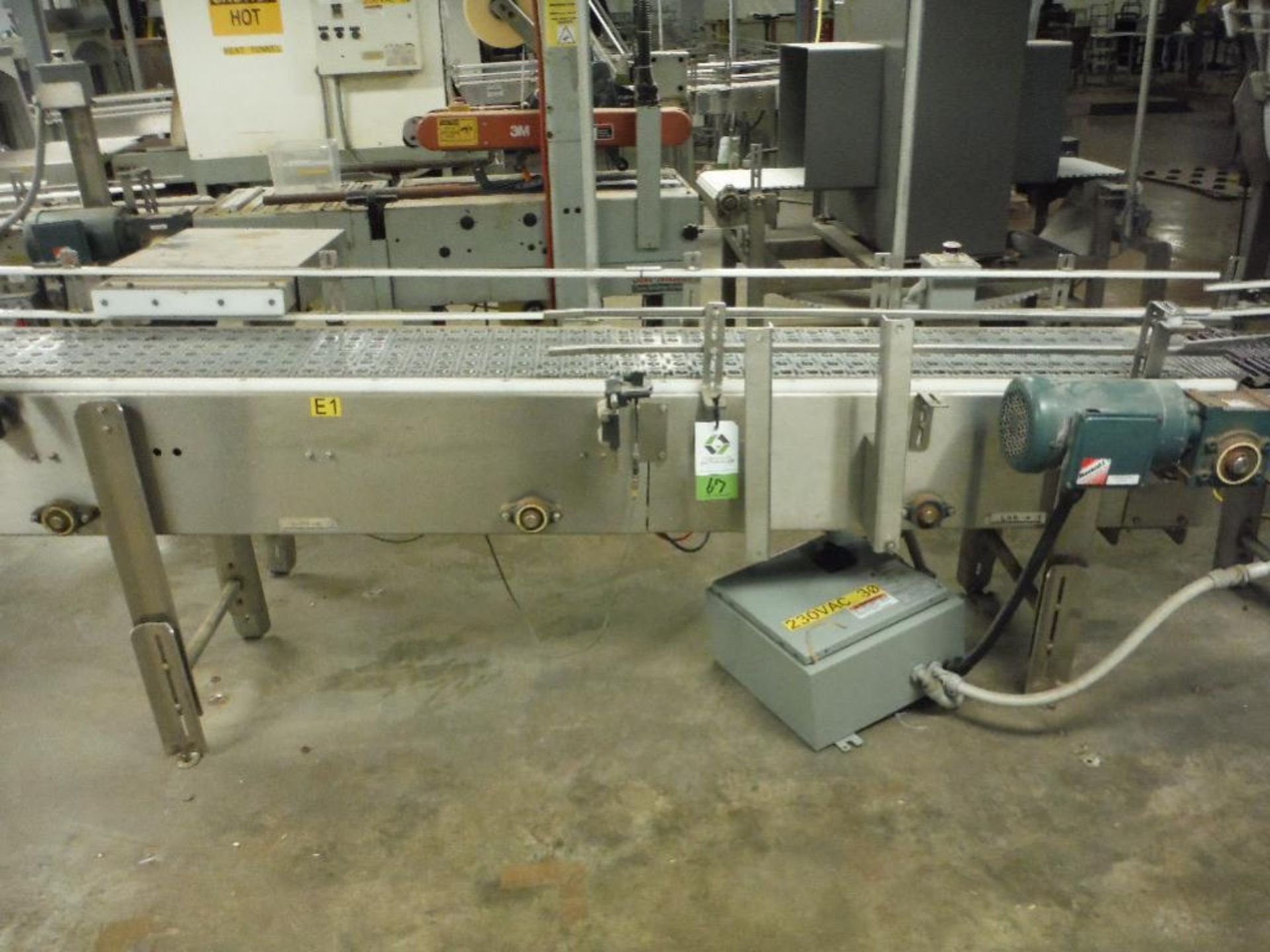 SS infeed conveyor, 102 in. x 12 in., w/ drive and reject ram. Rigging Fee: $150 - Image 8 of 10