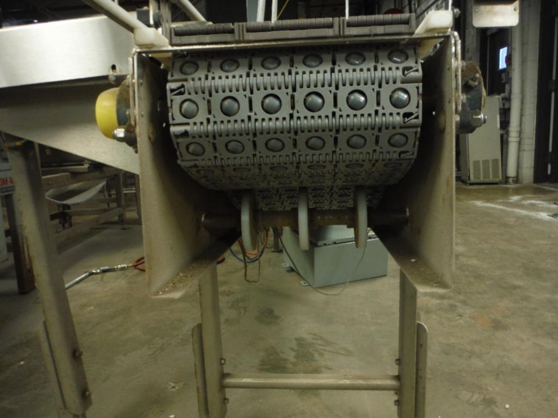 SS infeed conveyor, 102 in. x 12 in., w/ drive and reject ram. Rigging Fee: $150 - Image 9 of 10