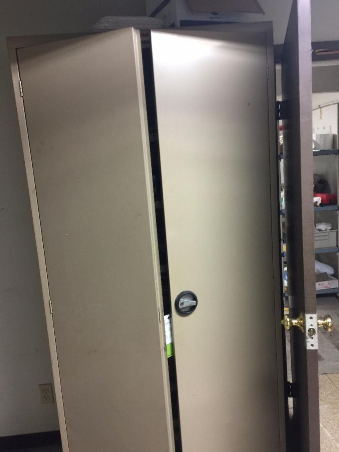 2 door metal cabinet and contents. Rigging Fee: $50 - Image 2 of 5