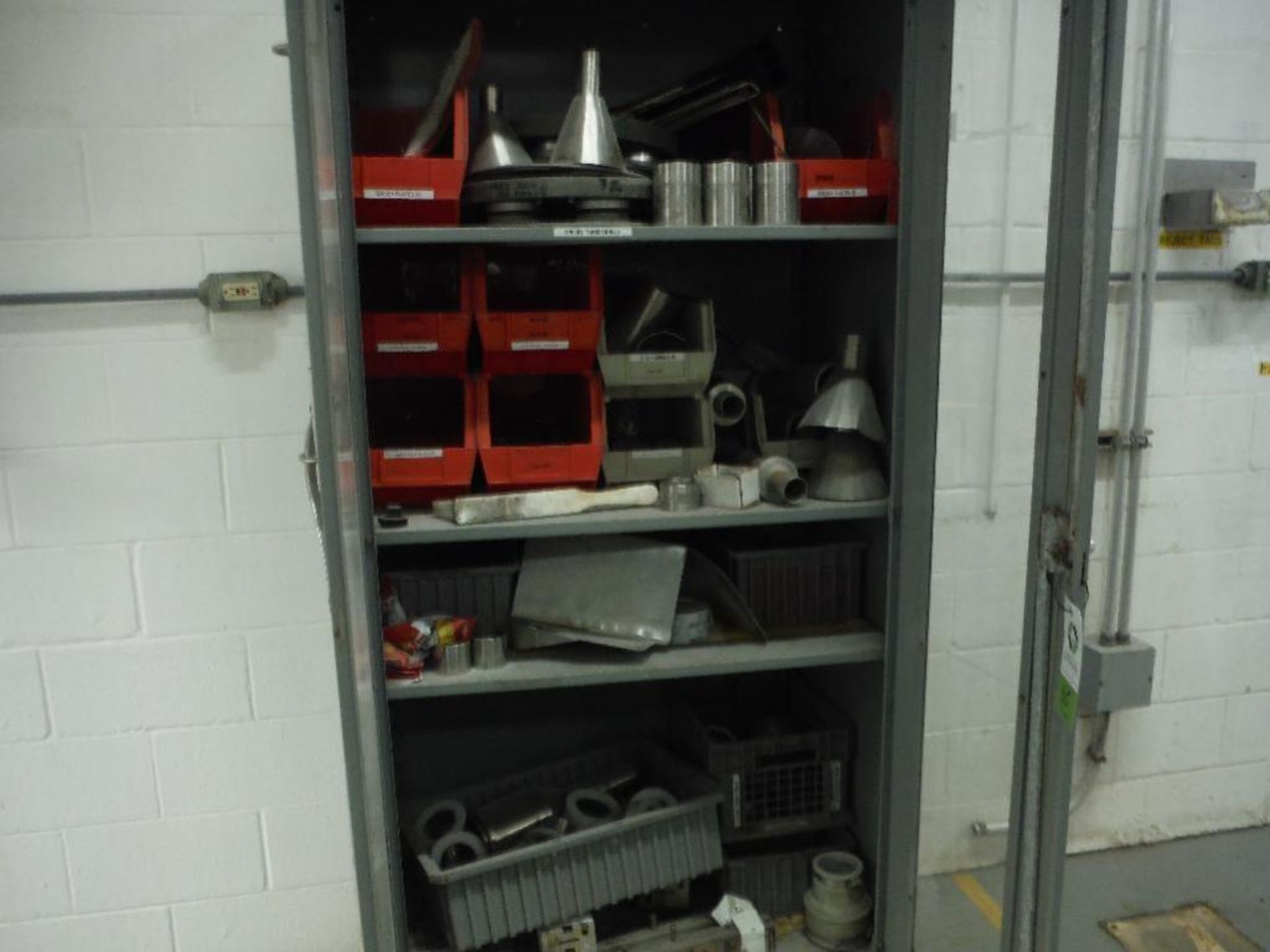 Cabinet w/ spare bagger and filler parts. Rigging Fee: $150