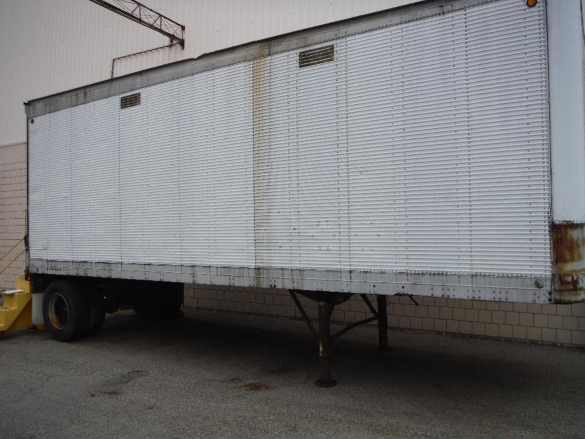 28 ft. Fruehauf Semi Trailer, single axel, roll up rear door, mfg. date 1984, VIN 2V02816EH020316, n