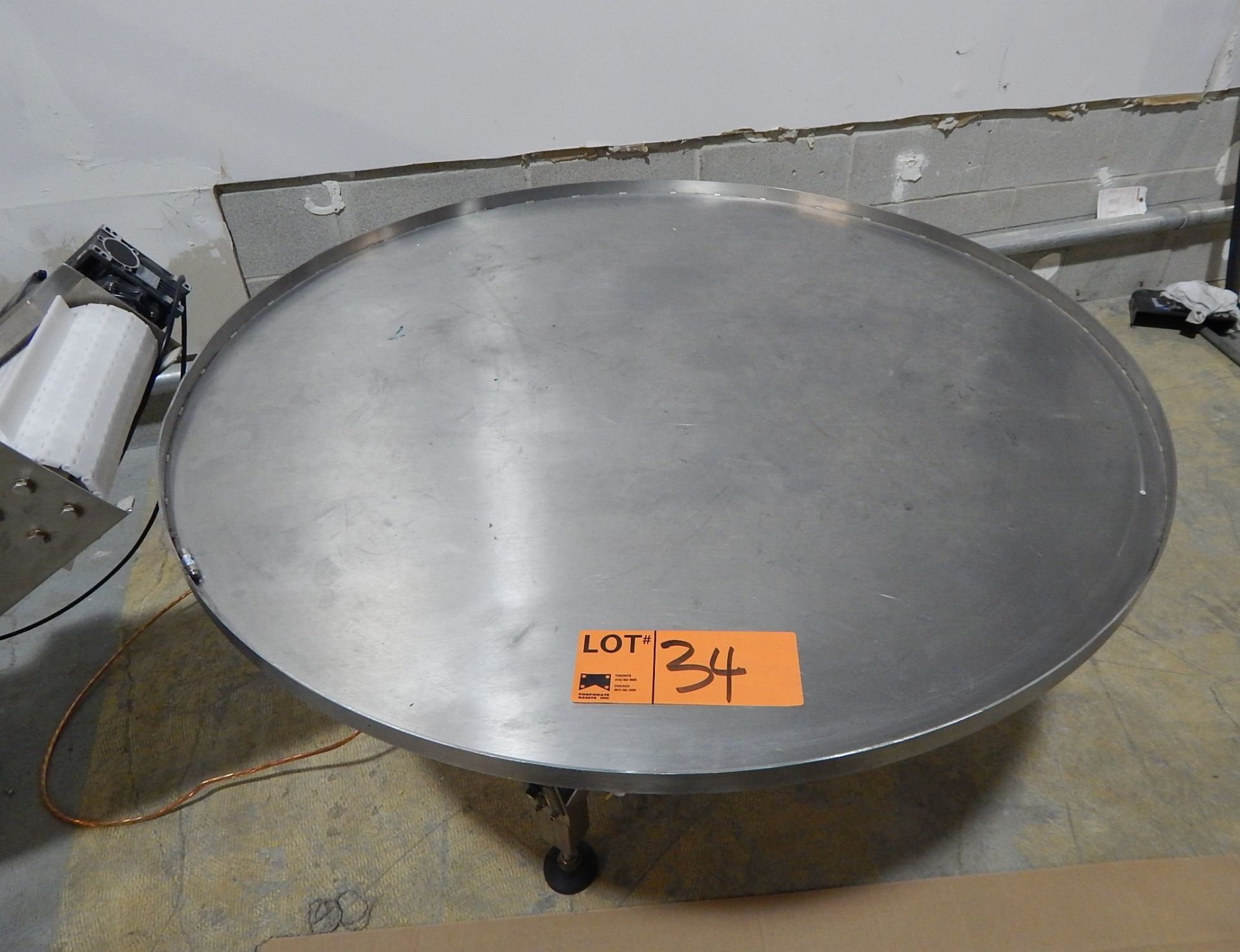 ROTATING RECEIVING TRAY