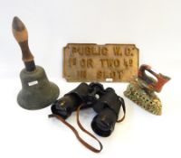 A quantity of flat irons, bell, a sign "Public W.C.