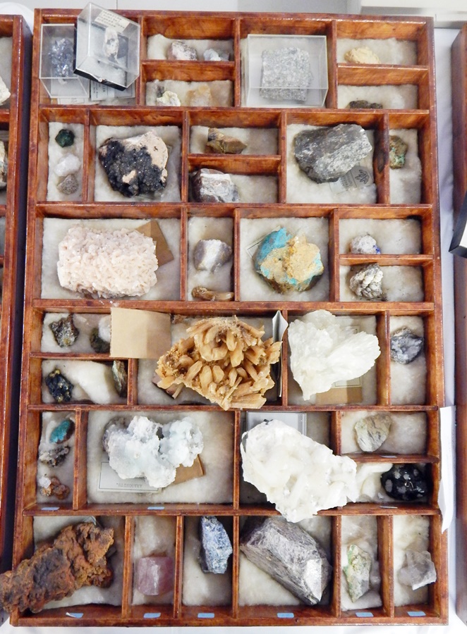 A collection of geological specimens to include natural and polished stones such as psilomelane,