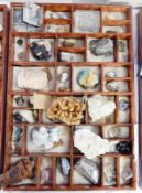 A collection of geological specimens to include natural and polished stones such as psilomelane,