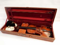 A Wolff violin with label and two bows,