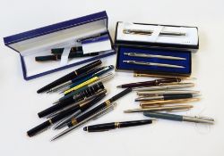 A quantity of fountain and rollerball pens to include early Swan fountain pen with 18ct gold