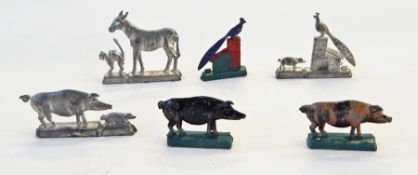 Painted lead models of pigs, in the style of Barrett & Sons,