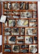 A tray of geological specimens to include natural and polished stones such as epidote, enargite,