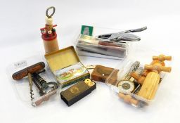 A collection of 20th century corkscrews, bottle openers, nutcracker, etc.