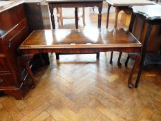 A Queen Anne style walnut veneer rectangular top coffee table, with glass insert,