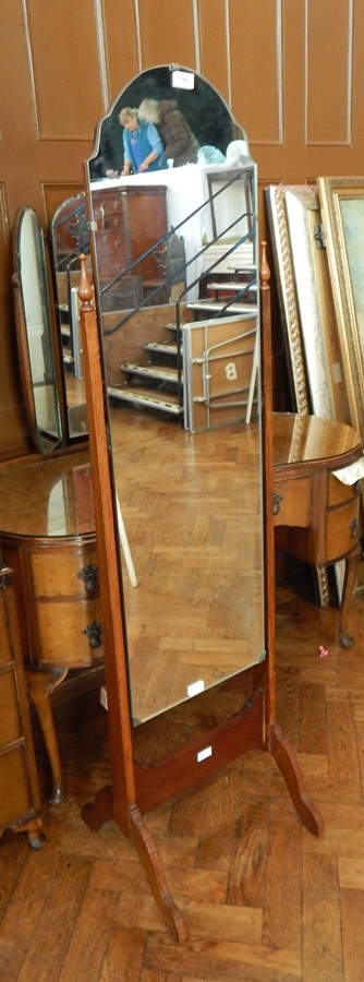 Plate glass cheval mirror with mahogany supports and splayed legs,
