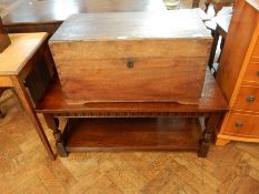 An oak rectangular top coffee table with undershelf, on turned supports, length 102cm,