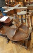 A nest of three oak occasional tables, a circular top side table with cup and cover carved pedestal,