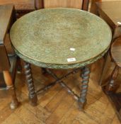 Brass topped Persian style occasional table with spirally twisted legs,