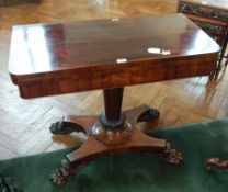 Early 19th century rosewood card table with foldover swivel top,