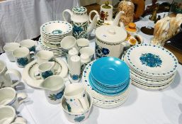 Large quantity JG Meakin studio dinnerware with stylised blue floral decoration,