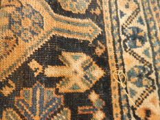 A Caucasian bordered rug with geometric design,