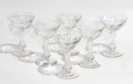 Six saucer champagnes with petal cut bowls, hour glass stem,