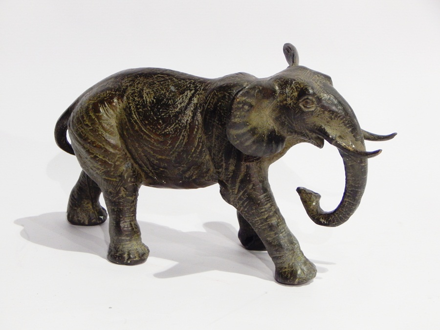 Bronzed metal model of an elephant,