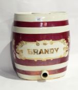 Large ceramic oval spirit barrel, "Brandy" with pink lustre and gold banding, lacking tap,