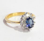 A blue and white stone cluster ring,