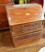 George III style inlaid mahogany bureau, with fan patera, four long drawers below, on castors,