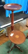 Mahogany circular top wine table with satinwood inlay on tripod support together with a modern