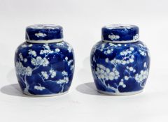 Pair Chinese porcelain ginger jars and covers with typical prunus blossom decoration, 11cm high,