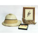 A collection of pictures and prints, a Christy's pith helmet retailed by Miller,